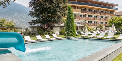 Familienhotel - Südtirol - Kinderpool mit Wasserrutsche - Hotel Paradies Family & Spa