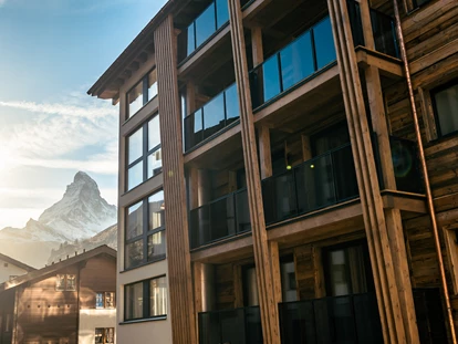 Familienhotel - Babyphone - Grächen - Zimmer und Appartements mit Aussicht auf das Matterhorn. - Resort La Ginabelle