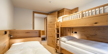 Familienhotel - Preisniveau: exklusiv - Saas-Almagell - Kinderzimmer im Appartement Weisshorn.  - Resort La Ginabelle