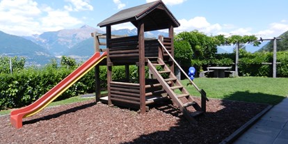 Familienhotel - Pools: Außenpool nicht beheizt - Schweiz - Kinderspielplatz - Top Familienhotel La Campagnola