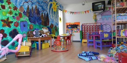Familienhotel - Kinderbetreuung in Altersgruppen - Schweiz - Kinderspielzimmer - Top Familienhotel La Campagnola