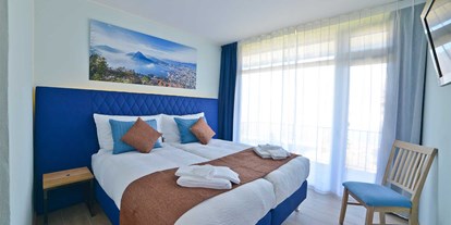 Familienhotel - Umgebungsschwerpunkt: Berg - Tessin - Family Suite Deluxe - Top Familienhotel La Campagnola