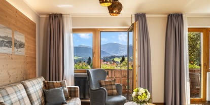Familienhotel - Einzelzimmer mit Kinderbett - PLZ 6580 (Österreich) - Chalet-Appartement - ideal für Familien mit 2 Kindern - MONDI Resort Oberstaufen