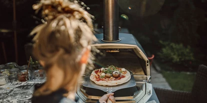 Familienhotel - Umgebungsschwerpunkt: am Land - Lesach - Pizzabacken macht Spaß - The RESI Apartments "mit Mehrwert"
