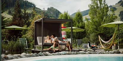 Familienhotel - Ladestation Elektroauto - Kirchdorf in Tirol - Relaxen am Pool - The RESI Apartments "mit Mehrwert"