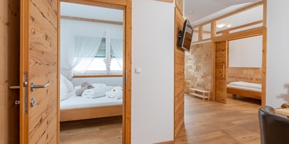 Familienhotel - Suiten mit extra Kinderzimmer - PLZ 8953 (Österreich) - Ferienwohnung Romantik Planai  - Sport & Familienhotel Bärenwirt