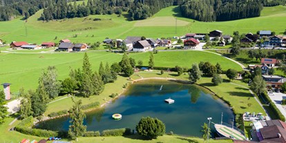 Familienhotel - Umgebungsschwerpunkt: Fluss - Sankt Johann im Pongau - Badesee neben dem Hotel Bärenwirt - Sport & Familienhotel Bärenwirt
