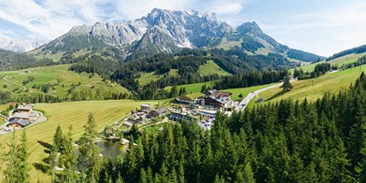 Familienhotel - WLAN - Oberndorf in Tirol - Außenaufnahme vom Übergossene Alm Resort - Übergossene Alm Resort