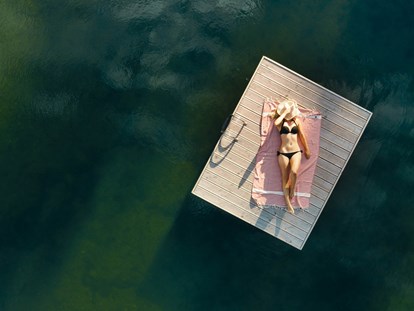 Familienhotel - Pools: Infinity Pool - Grießen (Leogang) - Hotel mit See - Übergossene Alm Resort