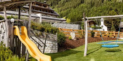 Familienhotel - bewirtschafteter Bauernhof - Italien - Spielplatz Sommer - Hotel Masl