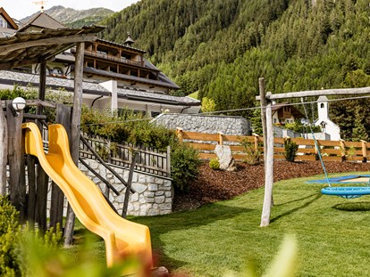 Familienhotel - Babyphone - Trentino-Südtirol - Spielplatz Sommer - Hotel Masl