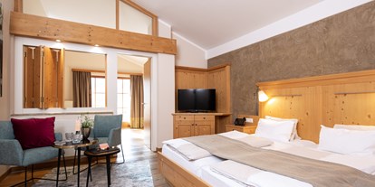 Familienhotel - Skikurs direkt beim Hotel - Mühlbach am Hochkönig - Zimmer Sonnenblume 40 m² - POST Family Resort
