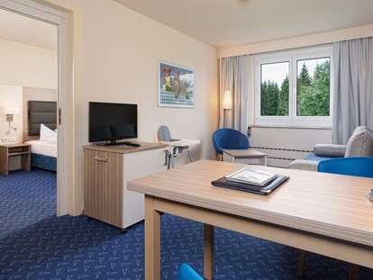 Familienhotel - Einzelzimmer mit Kinderbett - Appartement mit Babyausstattung  - Hotel Am Bühl