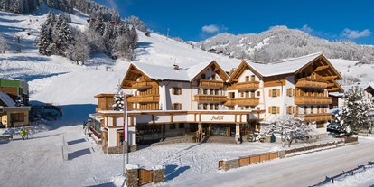 Familienhotel - Klassifizierung: 4 Sterne - PLZ 9822 (Österreich) - Hotel Auhof im Winter - Familienhotel Auhof