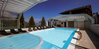 Familienhotel - Umgebungsschwerpunkt: Berg - Fai della Paganella - Fabilia Family Hotel Polsa - Trentino Südtirol überdachter Pool - Family Hotel Polsa