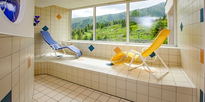 Familienhotel - Ponyreiten - PLZ 9082 (Österreich) - Ruheraum im Wellnessbereich - Familienhotel Schneekönig