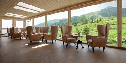 Familienhotel - Umgebungsschwerpunkt: Berg - Trebesing - Wintergarten mit Panoramafenster - Familienhotel Schneekönig