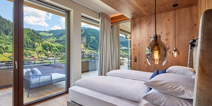 Familienhotel - Skikurs direkt beim Hotel - Familienzimmer - DAS EDELWEISS Salzburg Mountain Resort