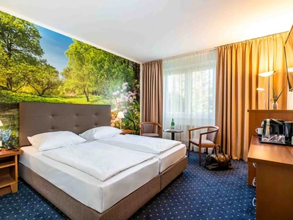 Familienhotel - barrierefrei - Wesenberg (Mecklenburgische Seenplatte) - Suite Schlafbereich - AHORN Seehotel Templin