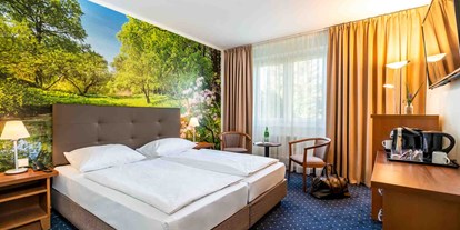 Familienhotel - Umgebungsschwerpunkt: am Land - PLZ 16831 (Deutschland) - Suite Schlafbereich - AHORN Seehotel Templin