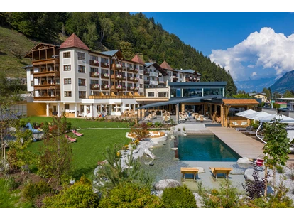 Familienhotel - Skilift - Kirchdorf in Tirol - Garten - Familien- und Sportresort Alpenblick