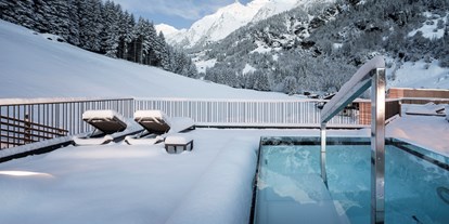 Familienhotel - Umgebungsschwerpunkt: Fluss - Kühtai - Die Dachterrasse im Winter - Feuerstein Nature Family Resort