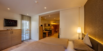 Familienhotel - Suiten mit extra Kinderzimmer - Appartement Family Junior - Familien-Wellness Residence Tyrol