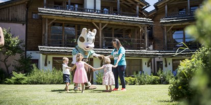 Familienhotel - Garten - Sexten - Post Alpina - Family Mountain Chalets