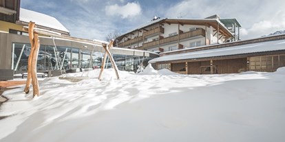 Familienhotel - Suiten mit extra Kinderzimmer - Sexten - Hotel Fameli im Winter - Hotel Fameli
