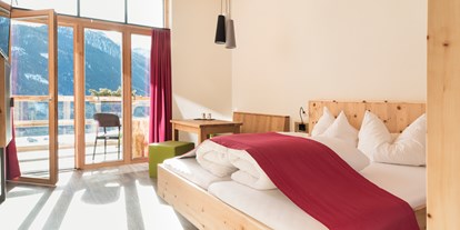 Familienhotel - Skikurs direkt beim Hotel - Familiensuite - Almfamilyhotel Scherer****s - Familotel Osttirol