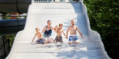 Familienhotel - Pools: Sportbecken - Obereggen (Trentino-Südtirol) - Wellenrutsche - Familien - und Wellnesshotel Prokulus
