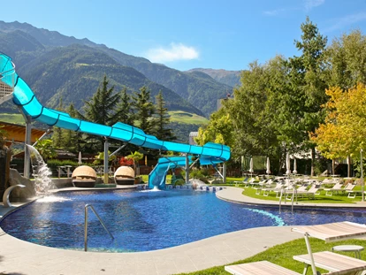 Familienhotel - Sauna - Dimaro - Outdoor-Erlebnisbad mit Riesenrutsche - Familien - und Wellnesshotel Prokulus