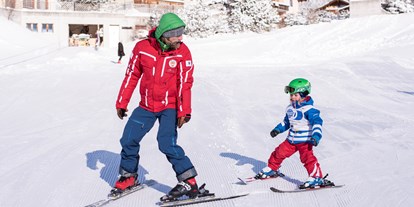 Familienhotel - Babyphone - Brand (Brand) - Skifahren lernen im Aparthotel Muchetta - Davos Wiesen - Graubünden - Schweiz - Aparthotel Muchetta
