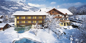 Familienhotel - Sankt Johann im Pongau - Hotel Lerch im Winter - Wellness & Familienhotel Lerch