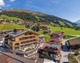 Kinderhotel: Hotel Alpin Spa Tuxerhof mit Sunset Relaxpool auf dem Dach - Hotel Alpin Spa Tuxerhof