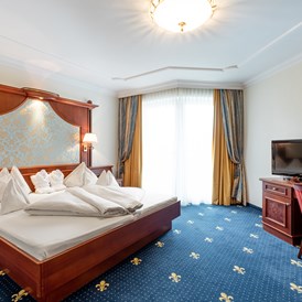 Kinderhotel: Schlafzimmer in der Luxus-Suite Familienresidenz - Hotel Seehof