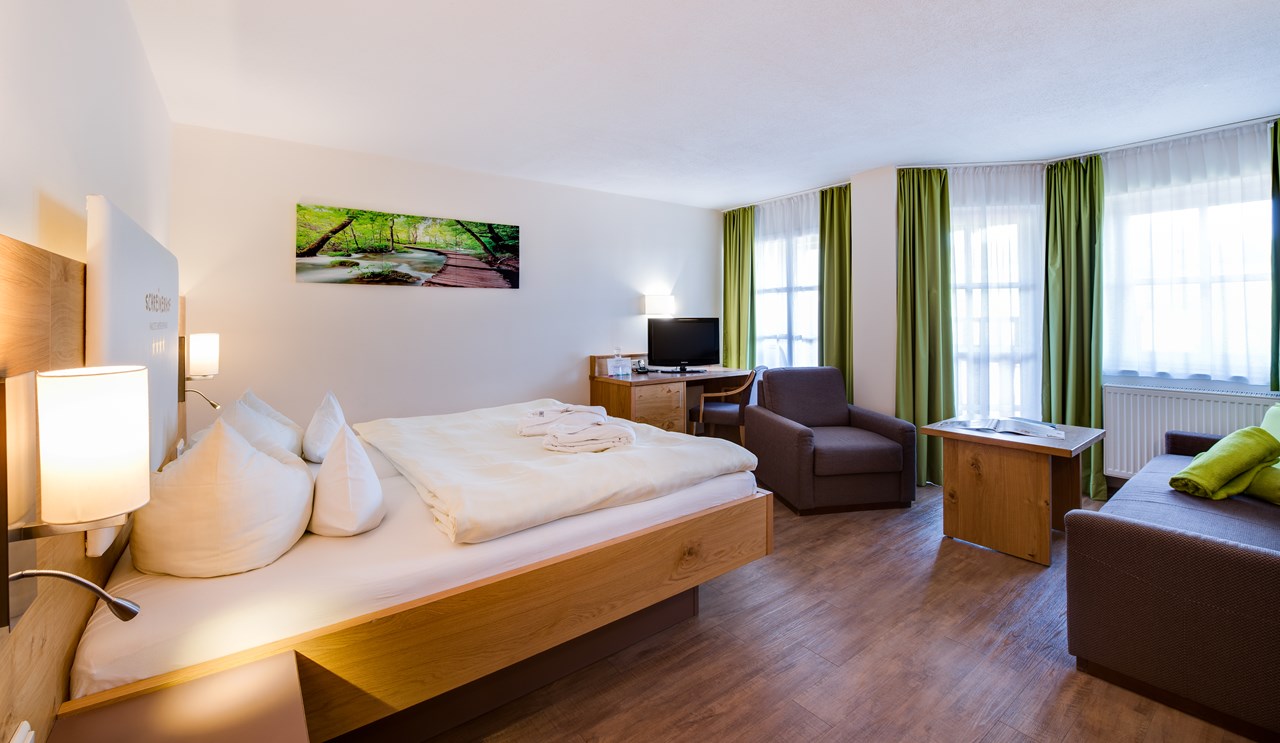 Familotel Schreinerhof - 4 Sterne Superior  Zimmerkategorien Family-Suite „Schreinerhof“ Mansarde