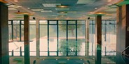 Familienhotel - Schwimmkurse im Hotel - Panoramapool im Family-SPAss-Bad - Familotel Landhaus zur Ohe