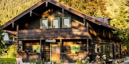 Familienhotel - Garten - Kirchdorf in Tirol - Das Bayrischzell Familotel Oberbayern