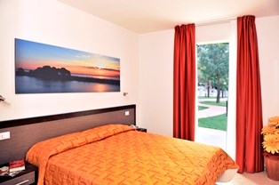 Kinderhotel: Residence Oasi - Schlafzimmer - Club Village & Hotel Spiaggia Romea