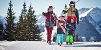Familienhotel - Jochberg (Jochberg) - Skifahren mit der ganzen Familien in Saalbach Hinterglemm © Mirja Geh - 4****S Hotel Hasenauer