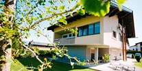 Familienhotel - Faakersee - Unsere Villa Karglhof mit neu renovierten Wohnungen und Suiten. - Ferienwohnungen und Seebungalows am Faaker See - Karglhof OG