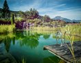Kinderhotel: Gartenteich - beste Badezeit Juni bis September - Naturhotel Kitzspitz