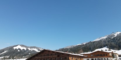Familienhotel - Garten - Kirchdorf in Tirol - Im Winter direkt an der Piste  - Naturhotel Kitzspitz