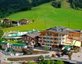 Kinderhotel: Über den Dächern von Hinterglemm, umgeben von Wiesen - Wellness-& Familienhotel Egger