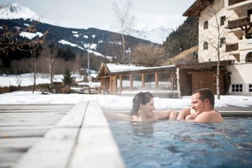 Kinderhotel: Alphotel Tyrol Außenpool Winter - Family & Wellness Resort Alphotel Tyrol