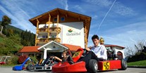 Familienhotel - Wasserrutsche - Hermagor - Gokart fahren - wöchentlich im Sommer - Hotel Glocknerhof