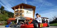 Familienhotel - Feld am See - Gokart fahren - wöchentlich im Sommer - Hotel Glocknerhof