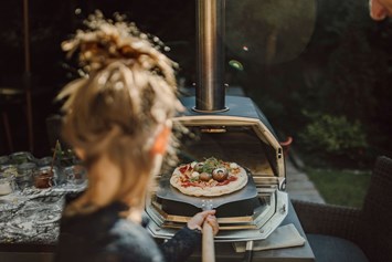 Kinderhotel: Pizzabacken macht Spaß - The RESI Apartments "mit Mehrwert"