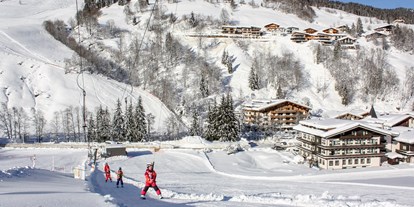 Familienhotel - Garten - Kirchdorf in Tirol - Ideale Lage: Abfahrten zum Hotel, Skilifte und Übungsgelände mit Skischule vis à vis - Gartenhotel Theresia****S - DAS "Grüne" Familienhotel 